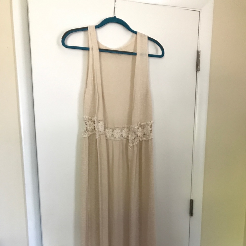 Cream color maxi cardigan.